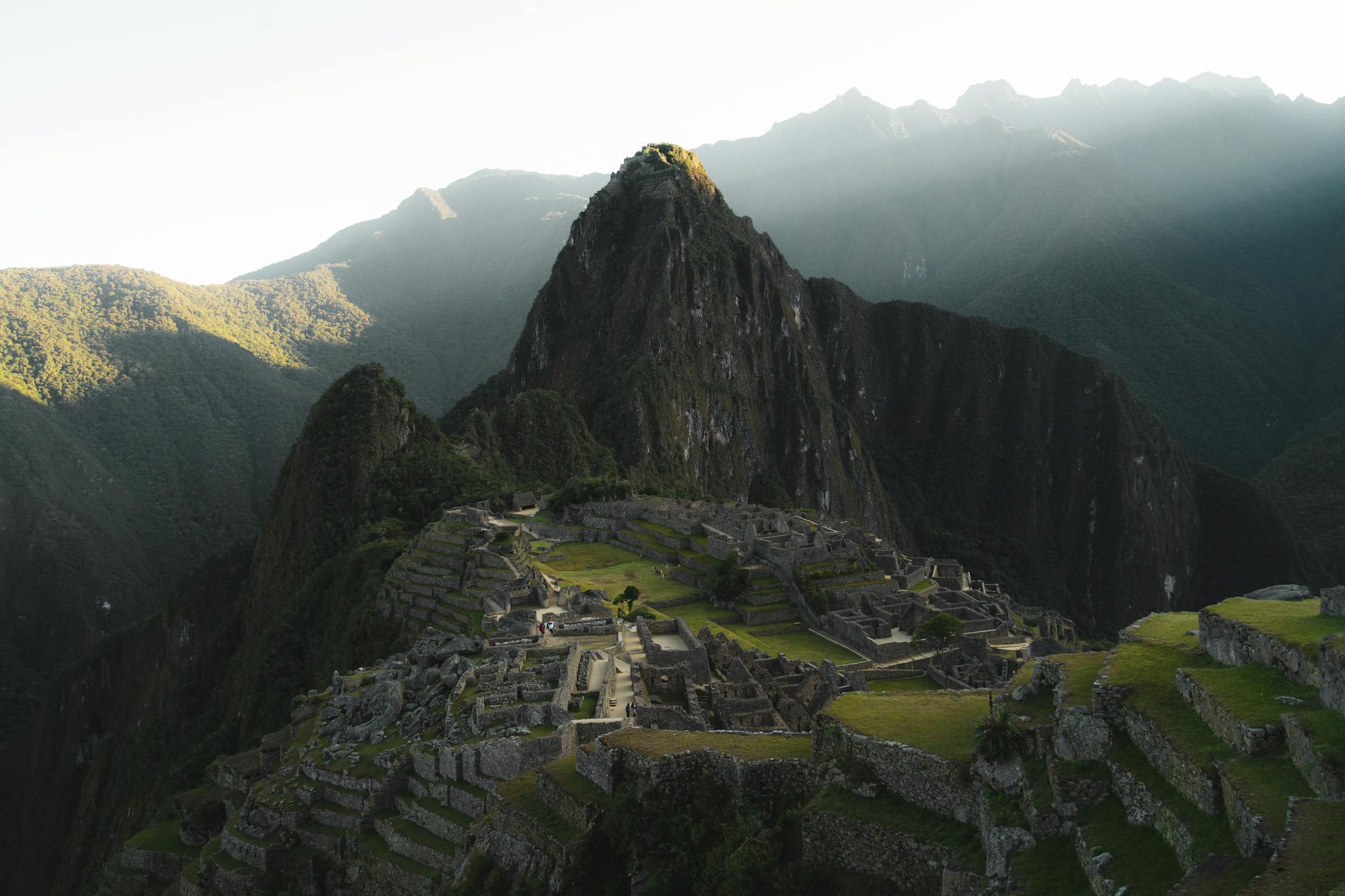 Experience the breathtaking beauty of Machu Picchu at sunrise, a UNESCO World Heritage Site in Peru.